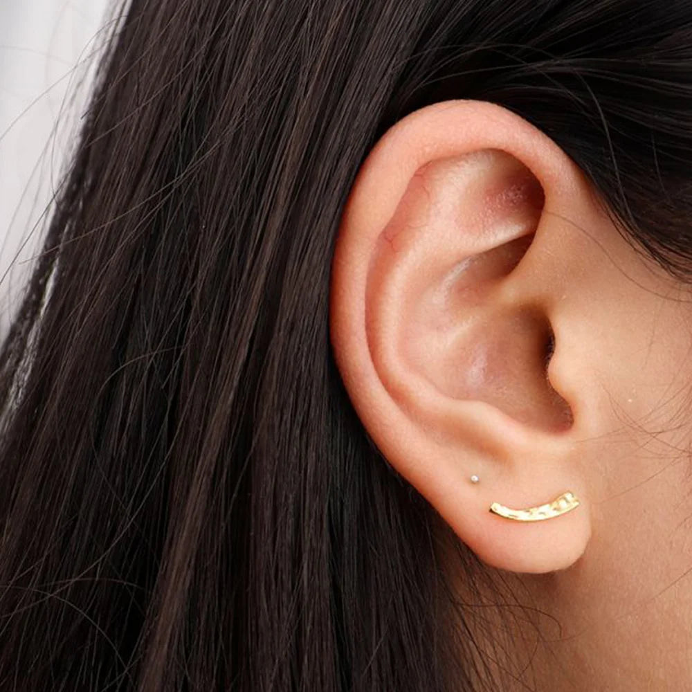 Frequency Paris-Ibiza Soluna Stud Earrings worn on model, chic and elegant minimalist design with hand-hammered texture