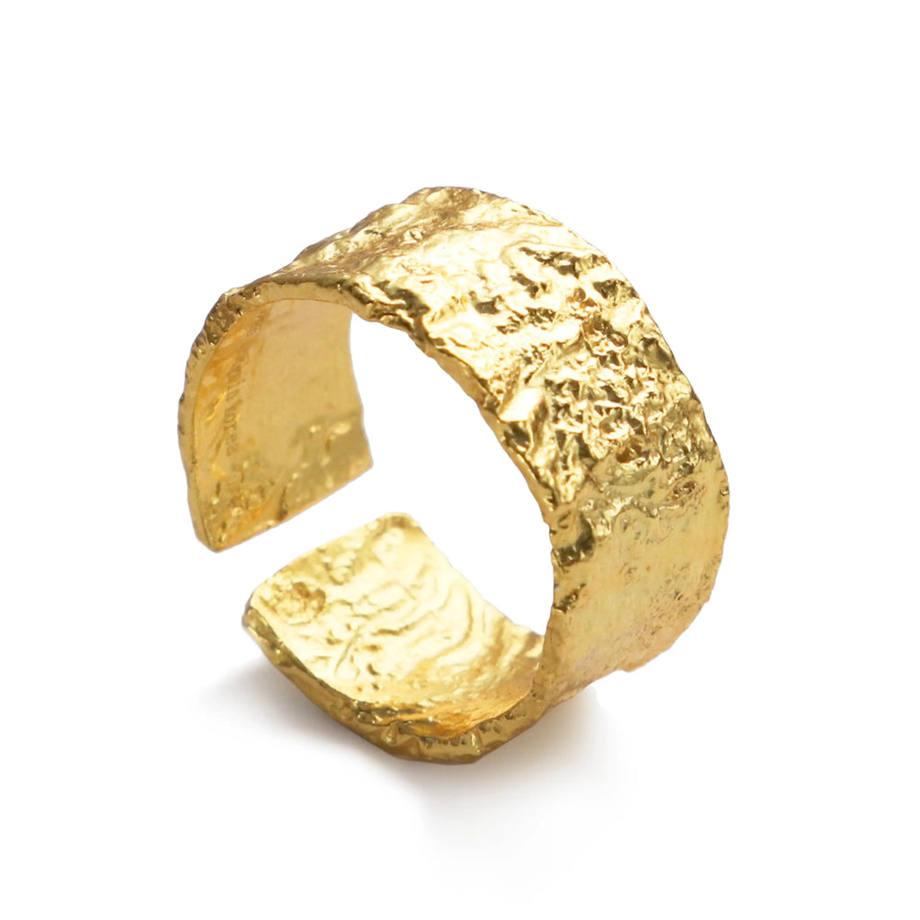 Gaia Ring by Frequency Paris-Ibiza, featuring a hammered gold texture that celebrates organic shapes, displayed against a clean white background. This adjustable ring is 18k gold-plated sterling silver, offering a grounded and contemporary design.