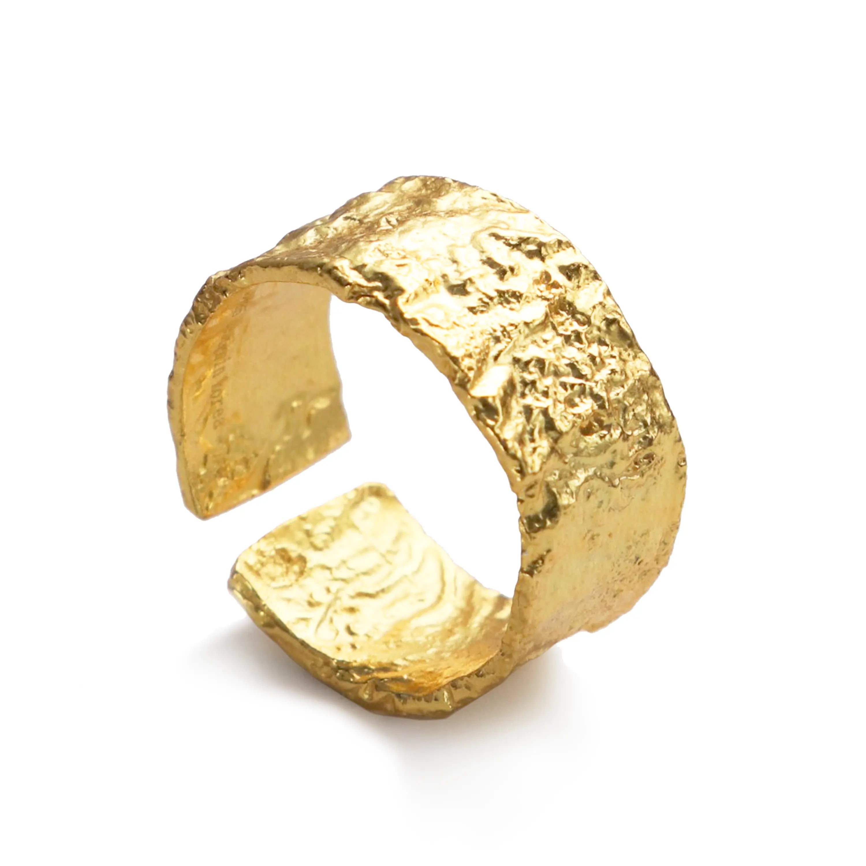 Gaia Ring by Frequency Paris-Ibiza, featuring a hammered gold texture that celebrates organic shapes, displayed against a clean white background. This adjustable ring is 18k gold-plated sterling silver, offering a grounded and contemporary design.